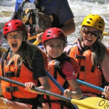 a group of people on a raft