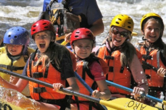 a group of people on a raft