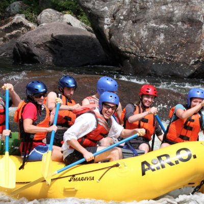 a group of people on a raft
