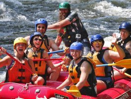 a group of people on a raft