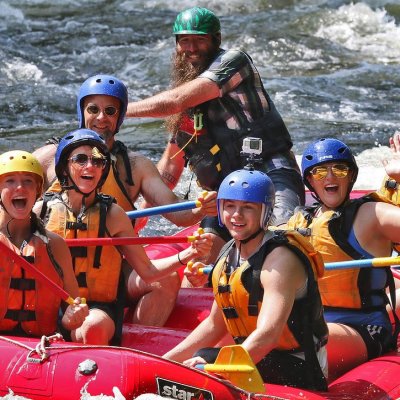 a group of people on a raft