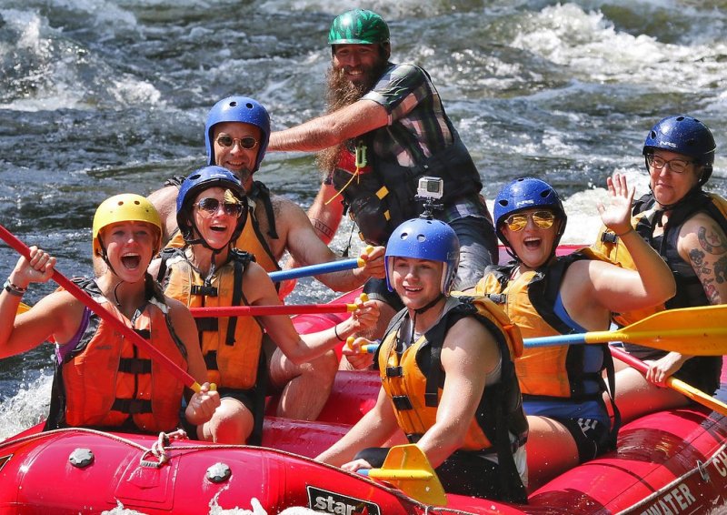 a group of people on a raft