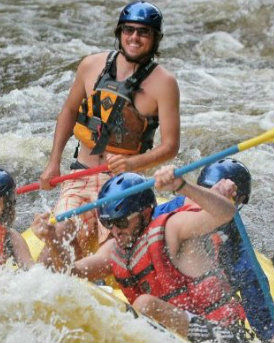 a person in a raft on the water